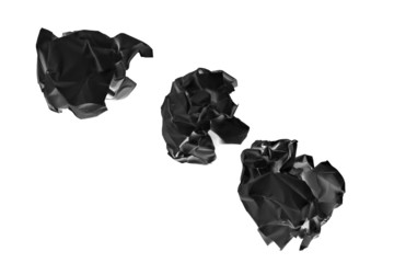 Crumpled black paper ball