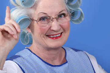 Old woman in rollers