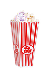 Popcorn in bucket with movie tickets