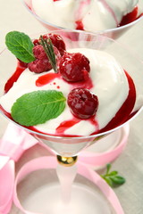 Yoghurt panna cotta with cherry sauce.