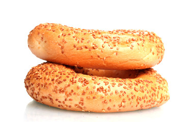 delicious bagels with sesame seeds isolated on white