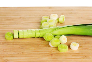 sliced ​​leek on wooden background