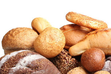 delicious breads and wheat isolated on white