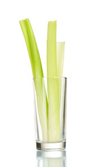 fresh green celery in a glass isolated on white