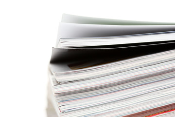 stack of magazines isolated on white