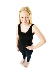 Fototapeta premium Girl on weight scale