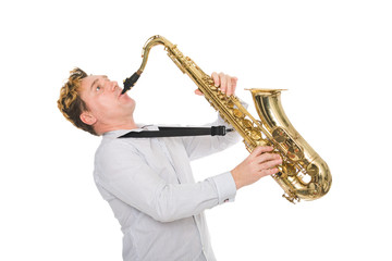 Young musician plays the saxophone