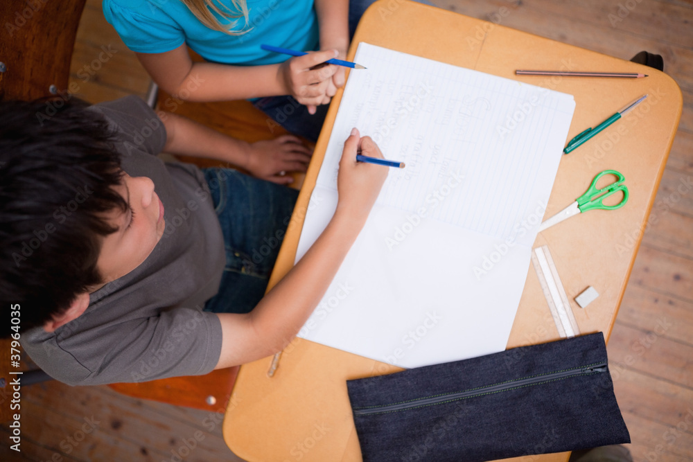 Poster above view of pupils working together