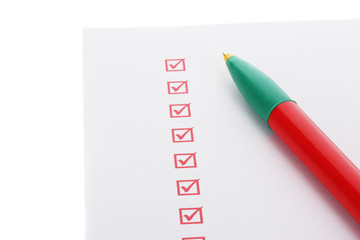 Checklist and pen isolated on white