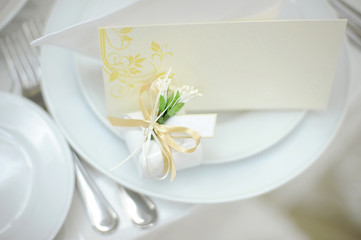accent of empty invitation card and bonboniere