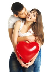 Heterosexual couple with a big heart on white background