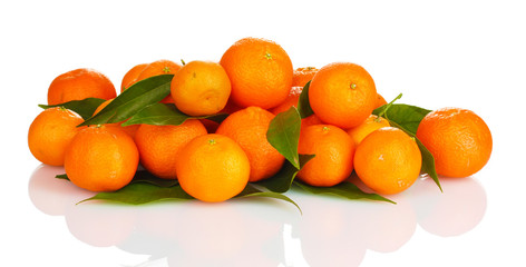 Ripe tasty tangerines with leaves isolated on white