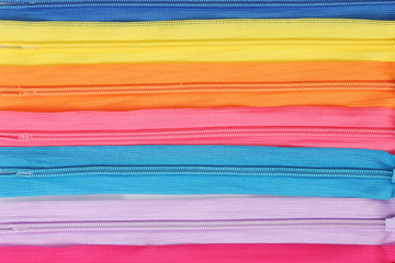 Multicolored zipper closeup © Africa Studio
