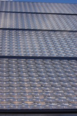 Solar Panel Equipped with Fresnel Lens Concentrators