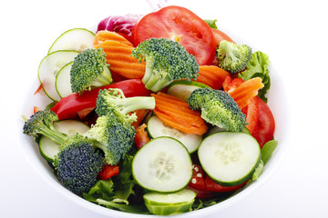 Cut Brocolli Cucumbers Carrots and Tomatoes