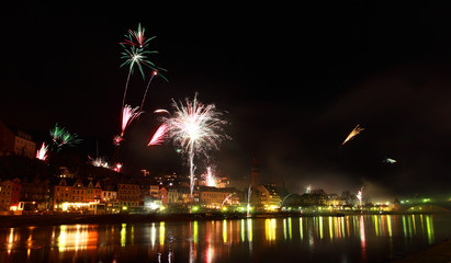 colorful fireworks close to river