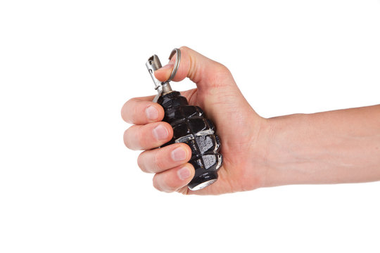 man holding a hand grenade