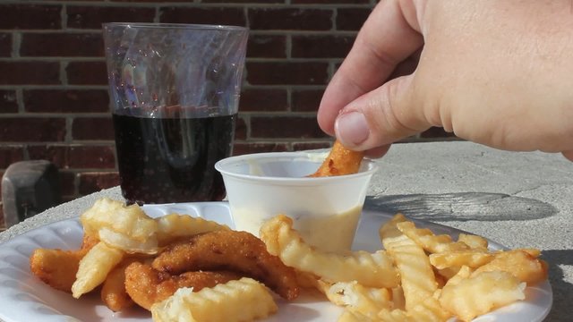 Hushpuppies, French Fries And Drinking Red Color Soda