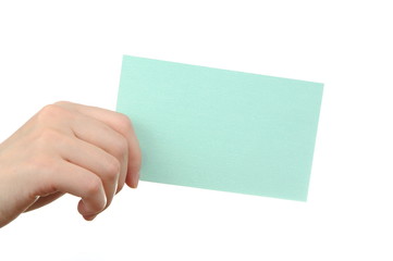 Empty light blue business card in a woman's hand