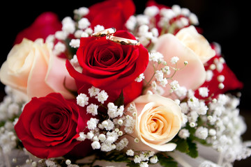 Gold wedding ring on flower