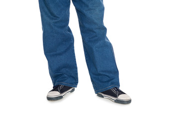 Men's jeans and gumshoes.