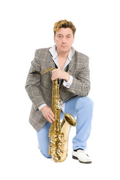 Portrait of a young man with a saxophone