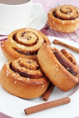 Cinnamon rolls with a cup of coffee