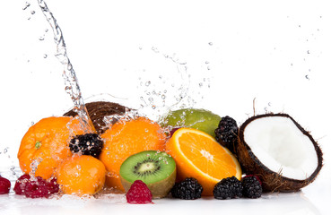 Fototapeta na wymiar Fruits in water splash, isolated on white background