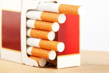 Cigarettes in pack on the breadboard
