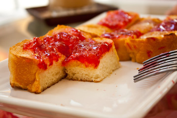 slice of bread with red jam