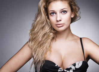 studio portrait of pretty fashionable girl