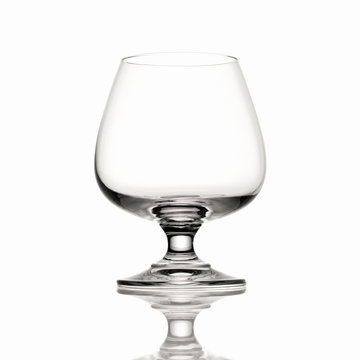 Empty Brandy glass on white background