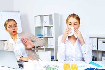 People with cold and flu  at work place