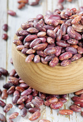 Red beans  on a wooden table