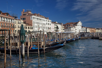 Venice cityscape with gondolas.