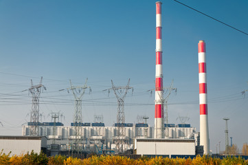 Fototapeta na wymiar power plant pylons and power lines