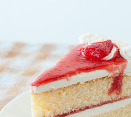 cake with cream and jelly strawberries