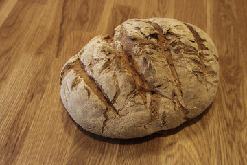 Whole-grain bread on a wooden background