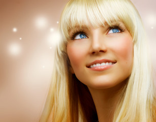 Pretty Teenage Girl with Healthy blond Hair