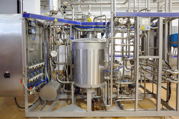 Lots of different interlocking metal pipes and reservoirs