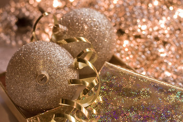 golden glass spheres in Christmas bright background