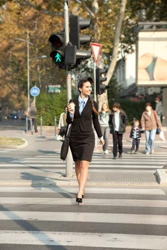 businesswoman walking on street