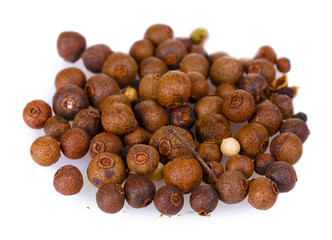 spice pepper in wooden spoon isolated on white