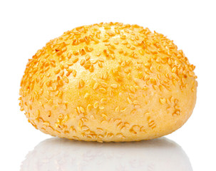 delicious bun with sesame seeds isolated on white
