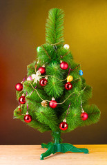 beautiful Christmas tree on wooden table