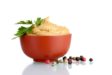 Mustard in bowl, spices and parsley isolated on white