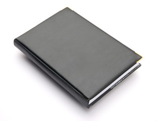 black cover notebook on white