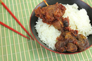 rice in cup on top ried chicken