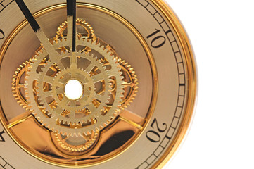 closeup golden clock with gears