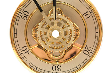 closeup golden clock with gears